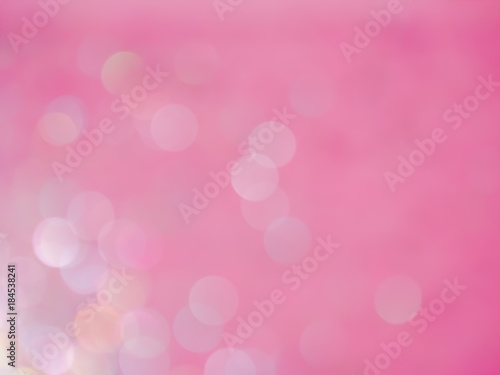 Pink bokeh light abstract background texture. Christmas and Valentine's pattern bokah, wallpaper.