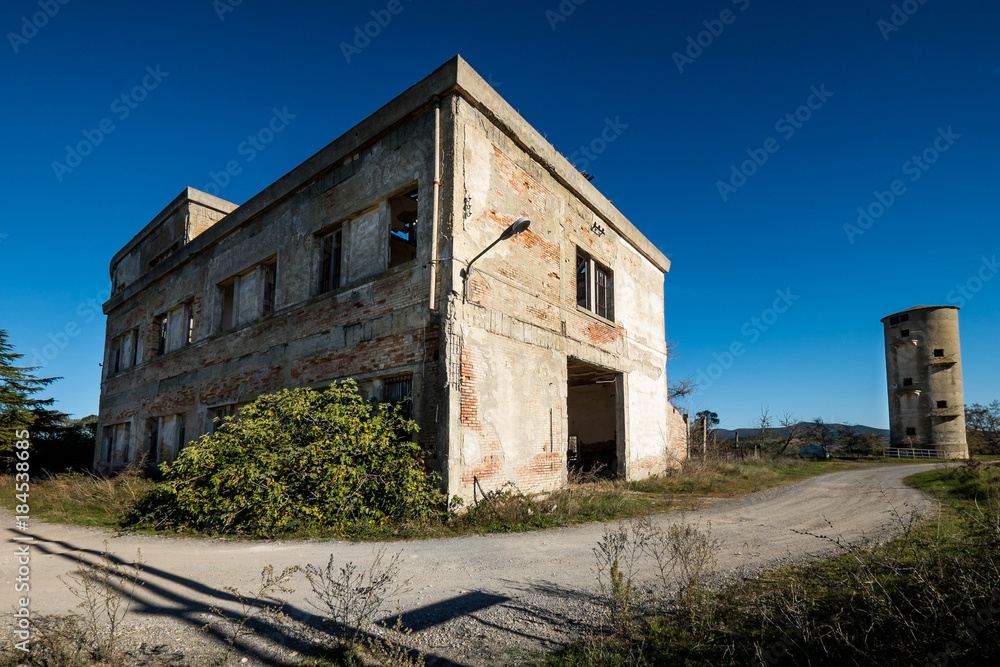 Volterra, Pisa, Italy - November 1, 2017: former Colonia Tanzi today abandoned, hikers depart from Saline for the Volterra hills