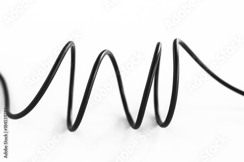 electric black wire cable curled shaped isolate on white background