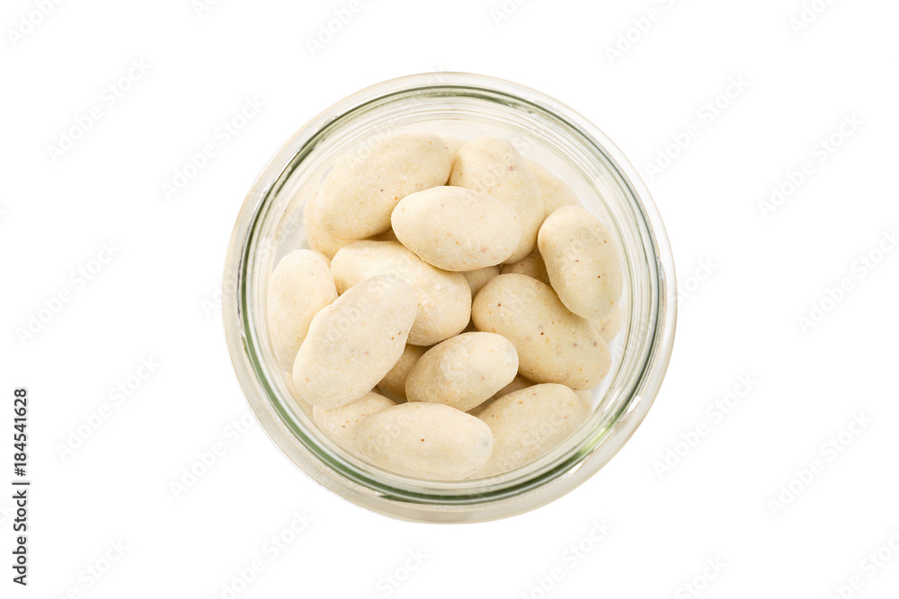 Set of nuts dragees on white background. Top view Set of nuts dragees on white background. Top view