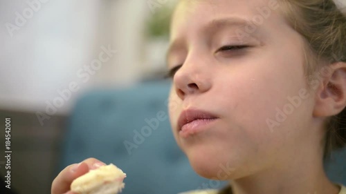 Cute Girl eat Biscuit Macaron Happily - close shot