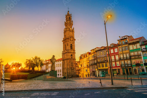 Beautiful sunset over famous Antonio Ferreira Bishop statue in front of garden Jardim de Cordoaria, known as Campo des Martires da Patria photo