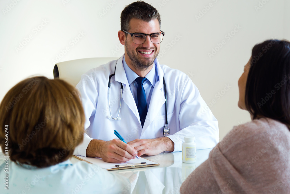Fototapeta premium Mother with little daughter having consultation at pediatrician office.