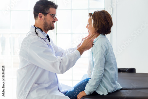 Girl being examined by pediatrician in the office.