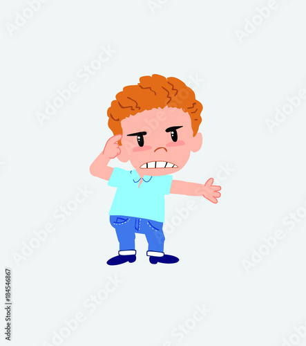 Blond boy in jeans, is angry and points his head with his index finger.