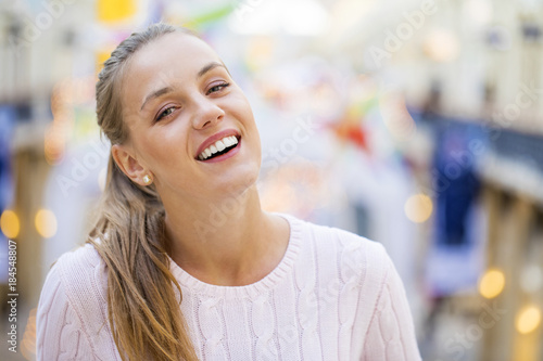 Portrait close up of young beautiful happy woman