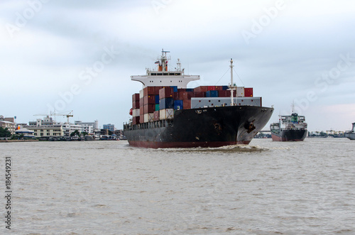 Container ship in the river