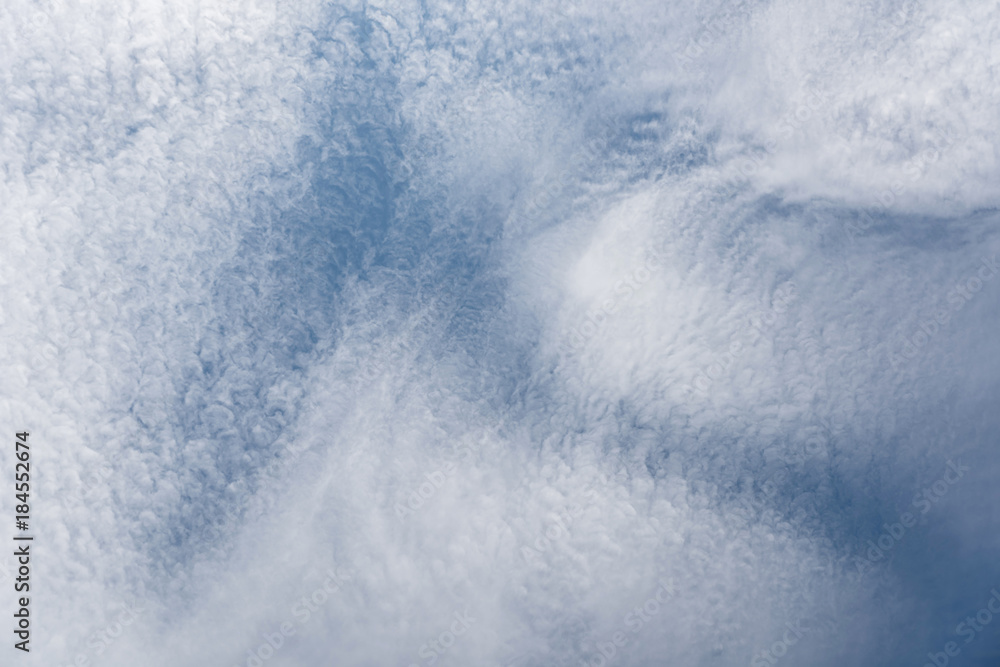 Cirrostratus cloudscape or Fluffy cirrus clouds on blue blue sky, Beautiful cirrocumulus on the high altitude layer Cirrostratus cloudscape or Fluffy cirrus clouds on blue blue sky, Beautiful cirrocumulus on the high altitude layer
