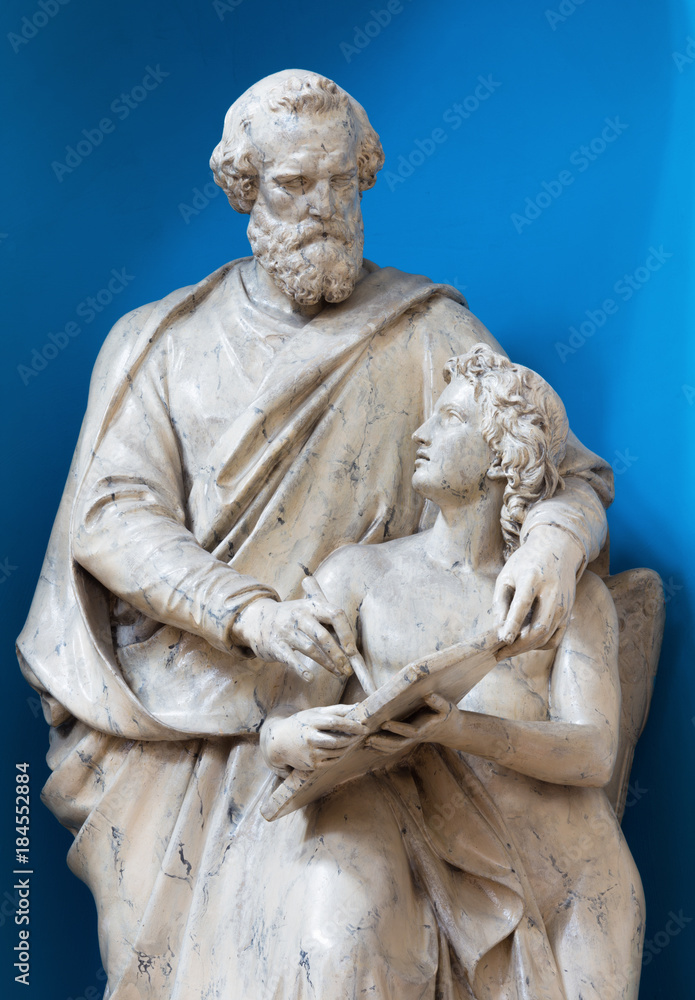 LONDON, GREAT BRITAIN - SEPTEMBER 17, 2017: The carved statue of St. Matthew the evangelist in St. Peter Italian church from end of 19. cent.