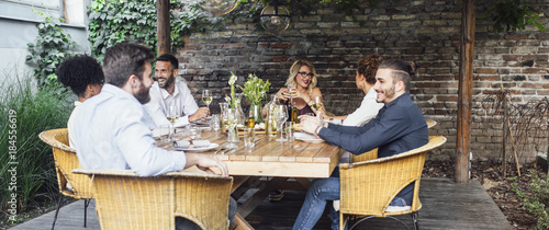 Friends Having Lunch Together at Restaurant