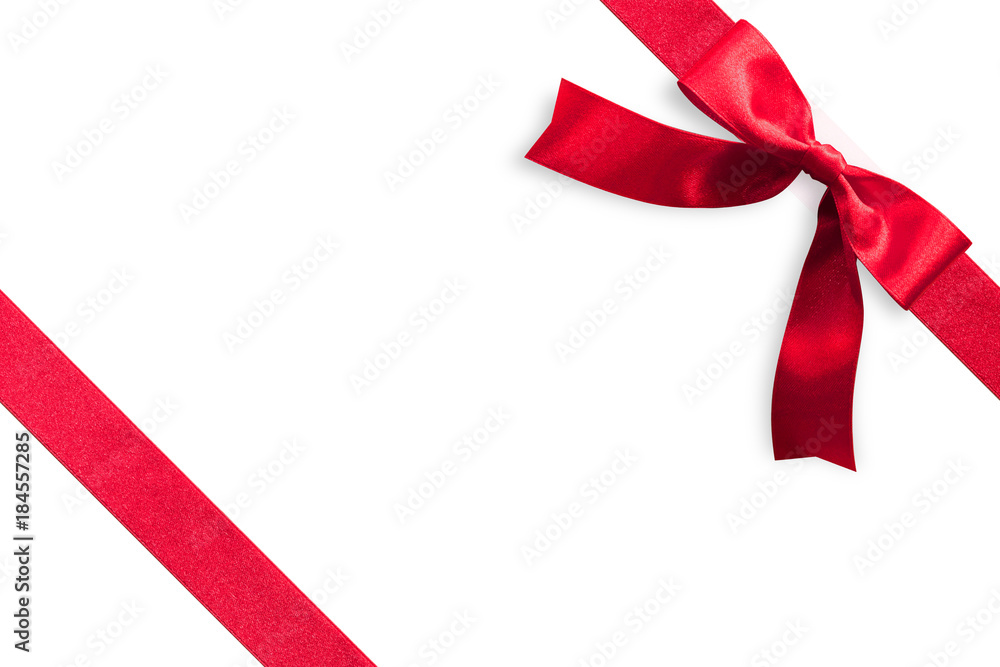 Red bow satin ribbon band stripe fabric on corner (isolated on white background with clipping path) for Christmas holiday gift box present wrap design decoration ornament element Red bow satin ribbon band stripe fabric on corner (isolated on white background with clipping path) for Christmas holiday gift box present wrap design decoration ornament element