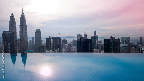 aerial view of Kuala Lumper skyline with roof top swimming pool