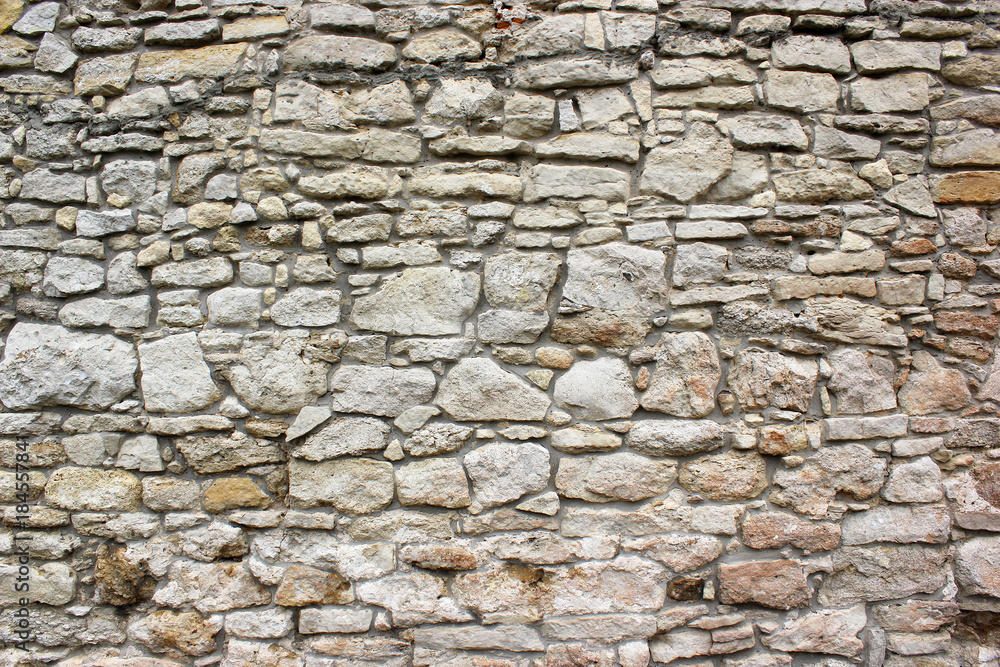 Fototapeta premium Stone wall texture, closeup.