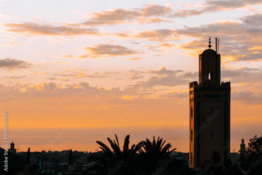 silhouetted minaret tower at marrakech