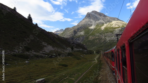 Mountain Train in Swiss Alps During Summer