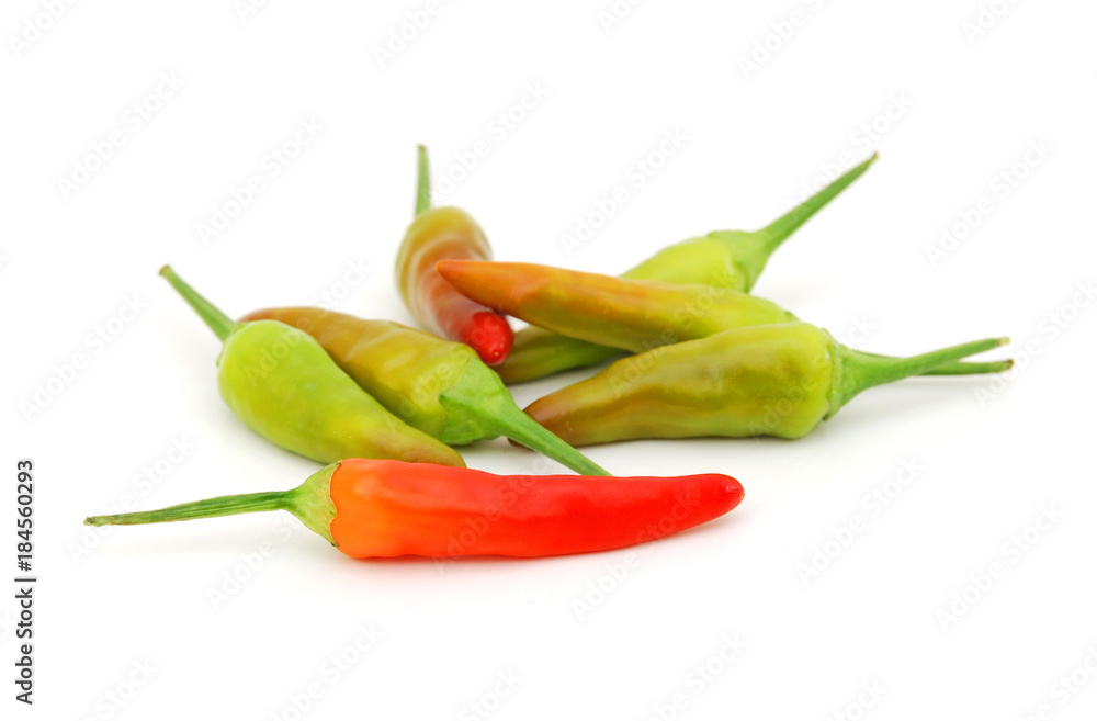 Heap of green Chili peppers isolated on white background Heap of green Chili peppers isolated on white background