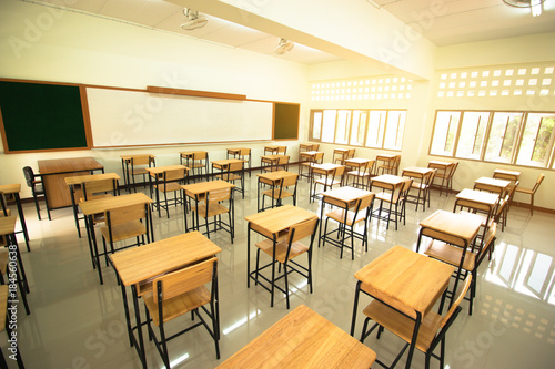 Lecture room or School empty classroom with desks and chair iron wood in high school thailand  interior of