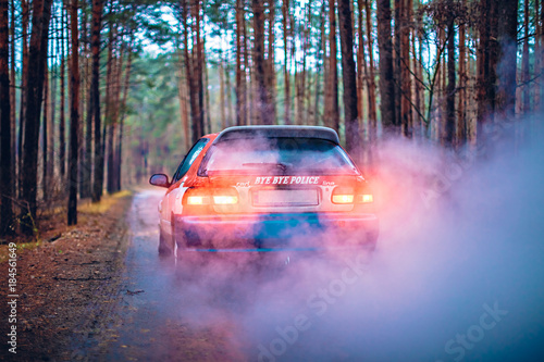 Street racing car in the forest