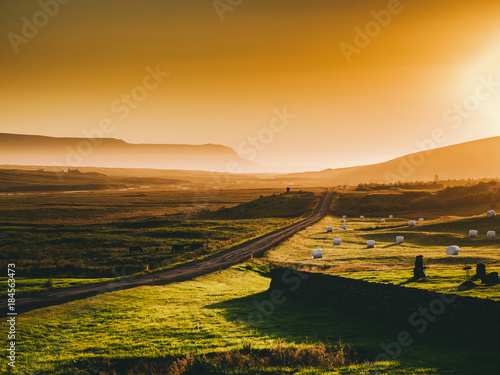beautiful landscape with road and mountains at sunset, Iceland