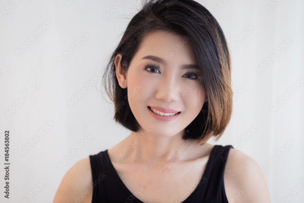 happiness asian girl smiling and laugh with black tshirt beauty concept white background happiness asian girl smiling and laugh with black tshirt beauty concept white background