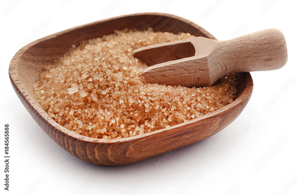 Brown sugar with wooden scoop Brown sugar with wooden scoop