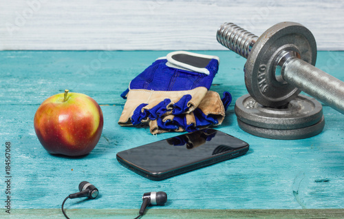 Sport Equipment. Dumbbells, Free Weights, Sport Gloves, Phone With Earphones