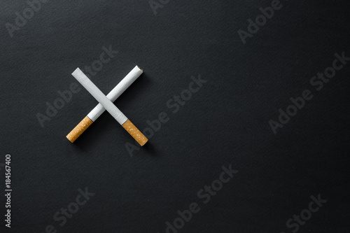 Cigarettes on a dark background.