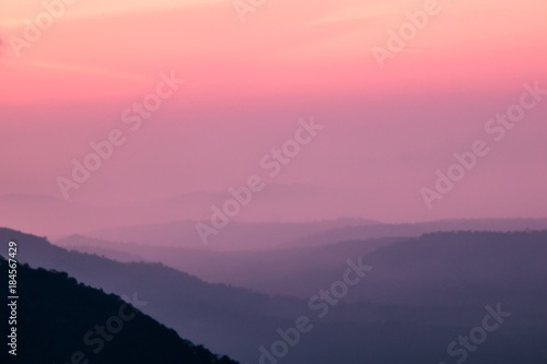 sunrise and foggy atmosphere over the hills at Khaoyai Thailand