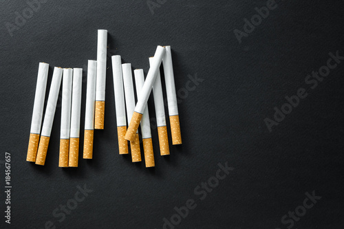 Cigarettes on a dark background.