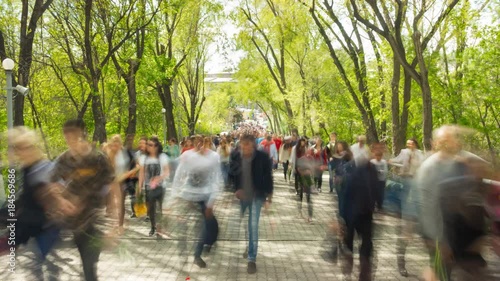 Wallpaper Mural Time lapse of crowd of people walking at you with blurred images on the background of nature Torontodigital.ca