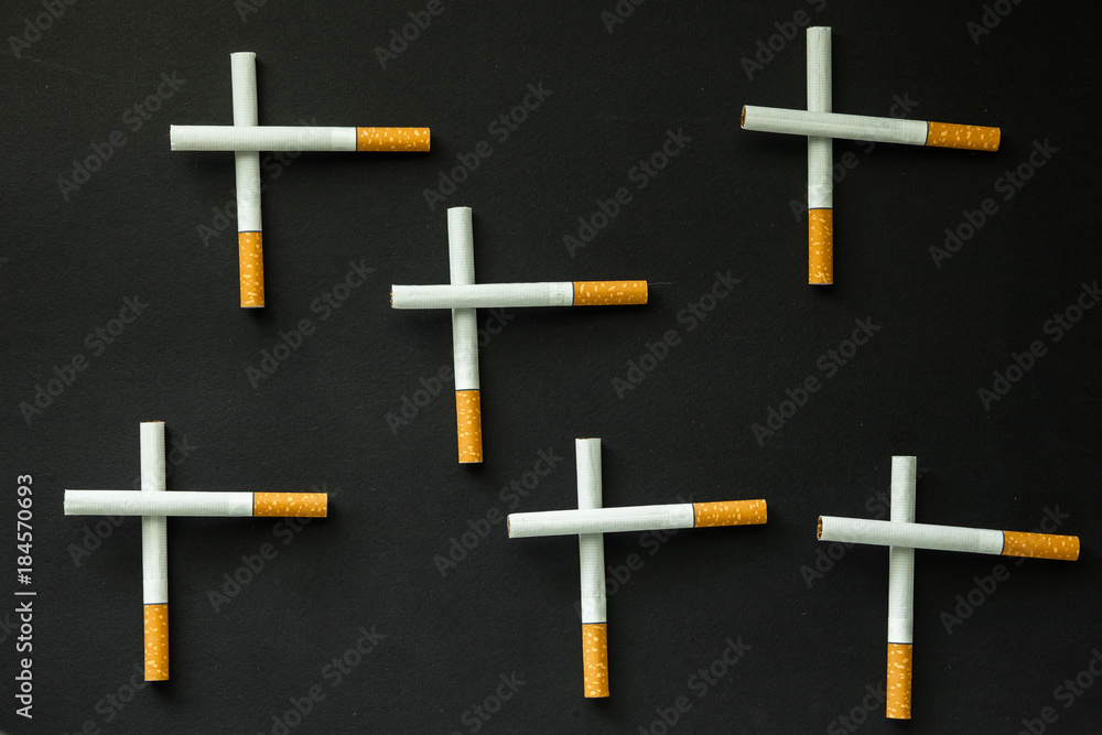 Cigarette on a dark background. quit Smoking Cigarette on a dark background. quit Smoking