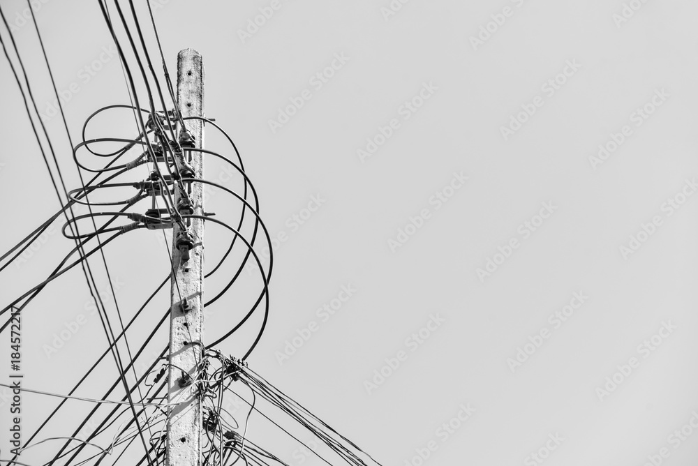 Electric Pole with Messy Wires in Black and White Electric Pole with Messy Wires in Black and White