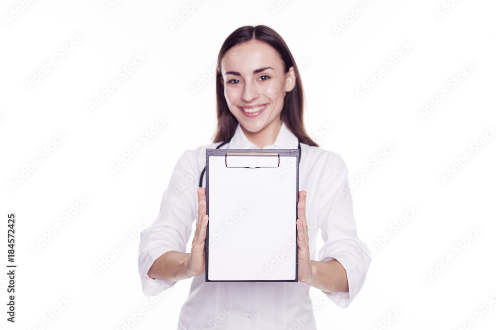Smiling beautiful Woman doctor with tablet for notes in her hands and looking into the camera isolated on white background. Smiling beautiful Woman doctor with tablet for notes in her hands and looking into the camera isolated on white background.