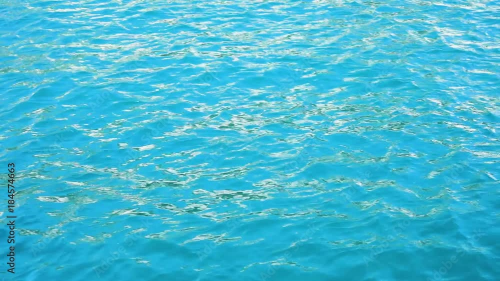Surface of clean turquious sea water with waves Surface of clean turquious sea water with waves