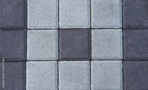 Stone paving tiles of different shapes and colors