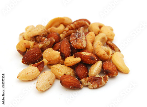 Mix of nuts close up on white