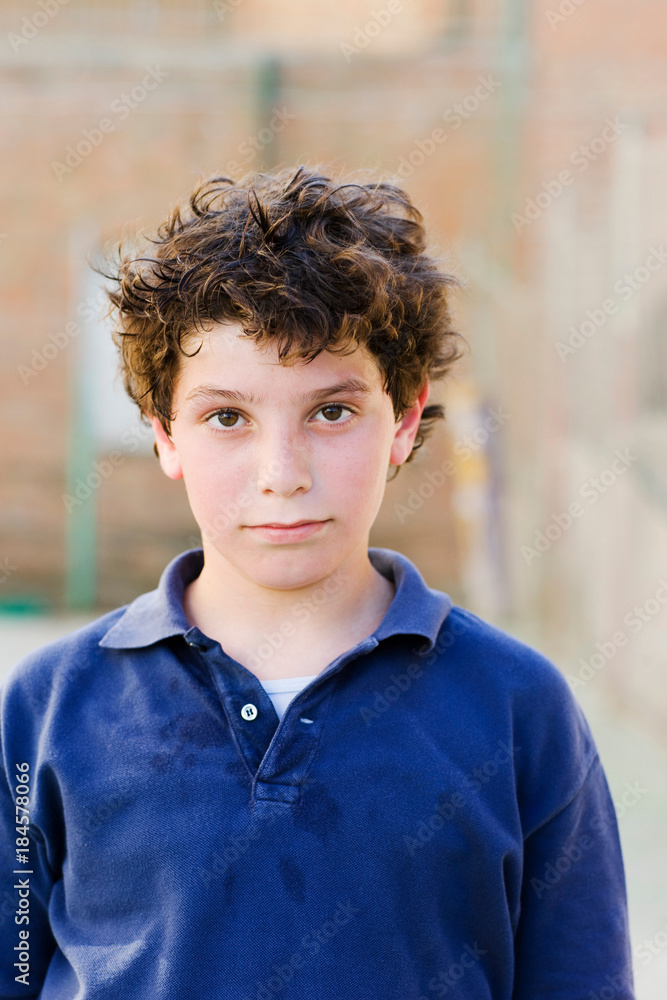Boy looking to camera on a sunny day Boy looking to camera on a sunny day