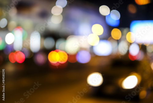 Abstract blurred bokeh background of car light on road in the city