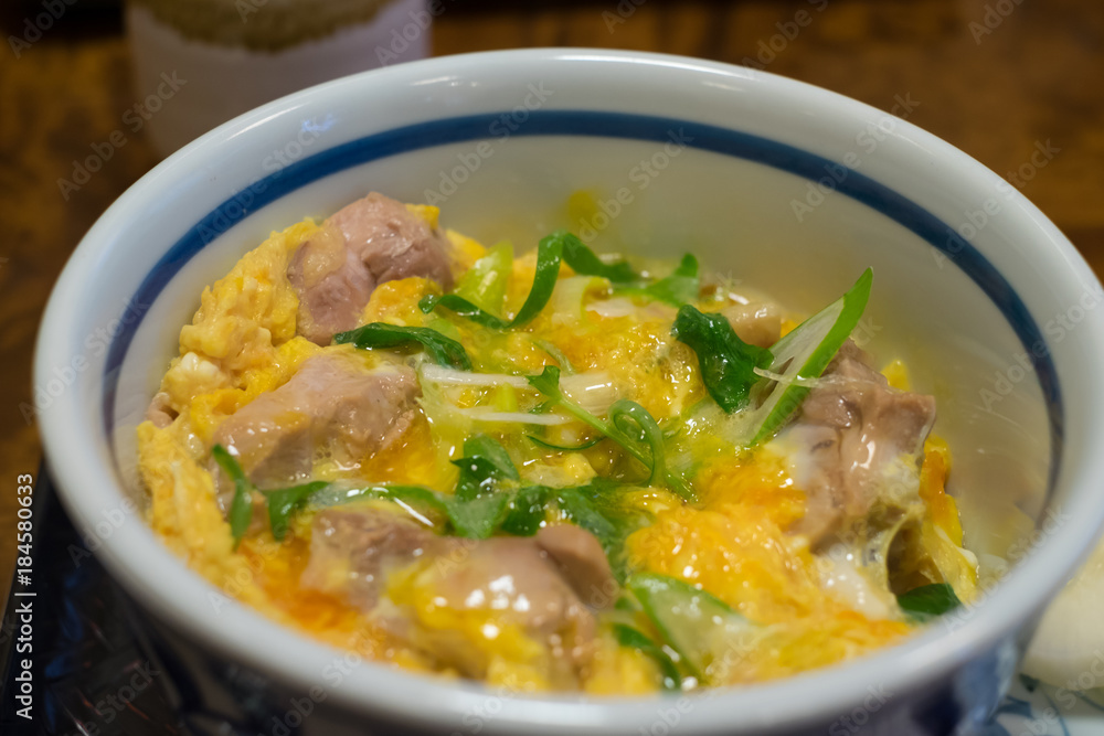 Oyako-don, a bowl of rice topped with chicken and eggs. (Japanese food)