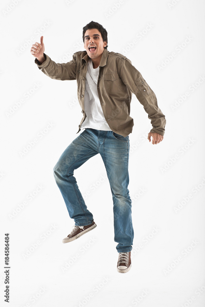 Man jumping on a white background