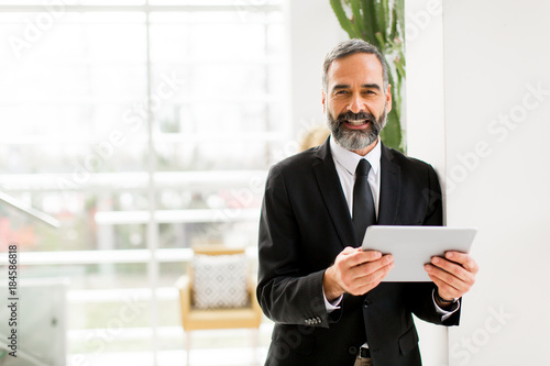 Middle age businessman with...