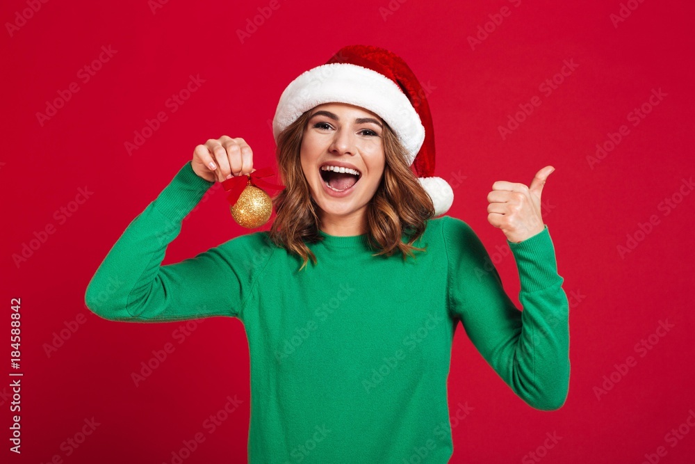 Woman wearing christmas santa hat Woman wearing christmas santa hat