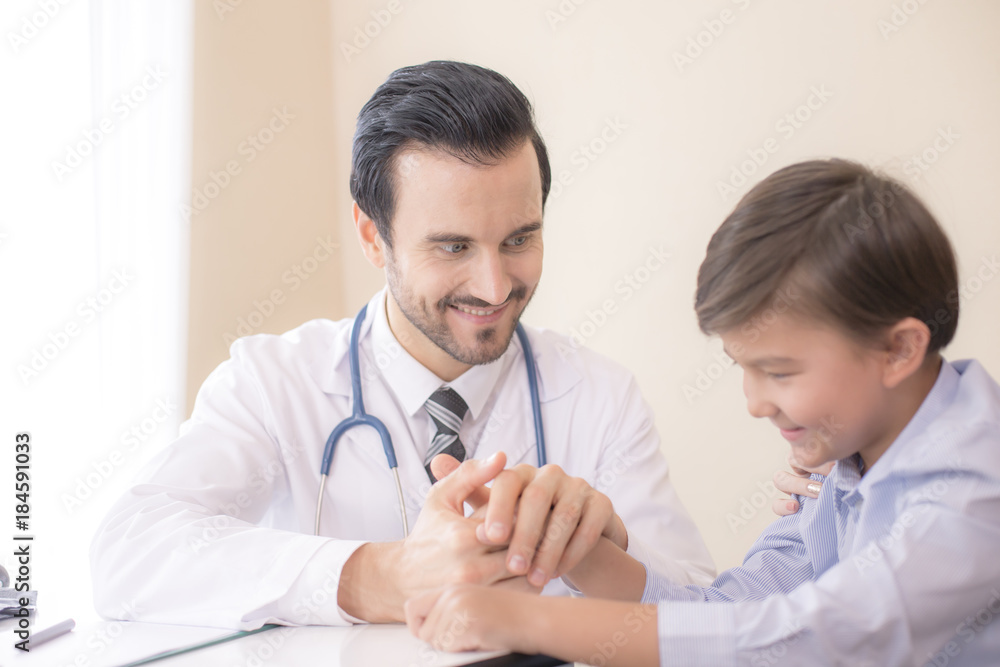 Attractive Doctor working at hospital. Doctor try to treat Kid for any problem. Attractive Doctor working at hospital. Doctor try to treat Kid for any problem.