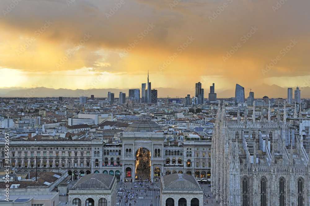 Italy - Milan december 13,2017 - Duomo cathedral, Vittorio Emanuele Gallery and skyline during the sunset