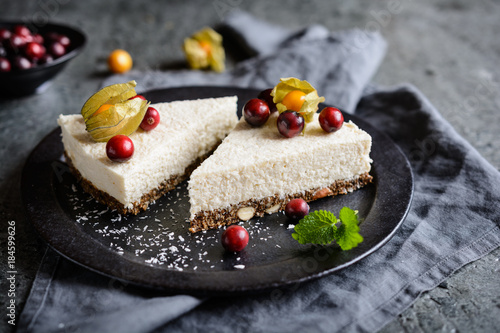 No bake yoghurt and coconut cake with almond, dried plums and chia seeds crust