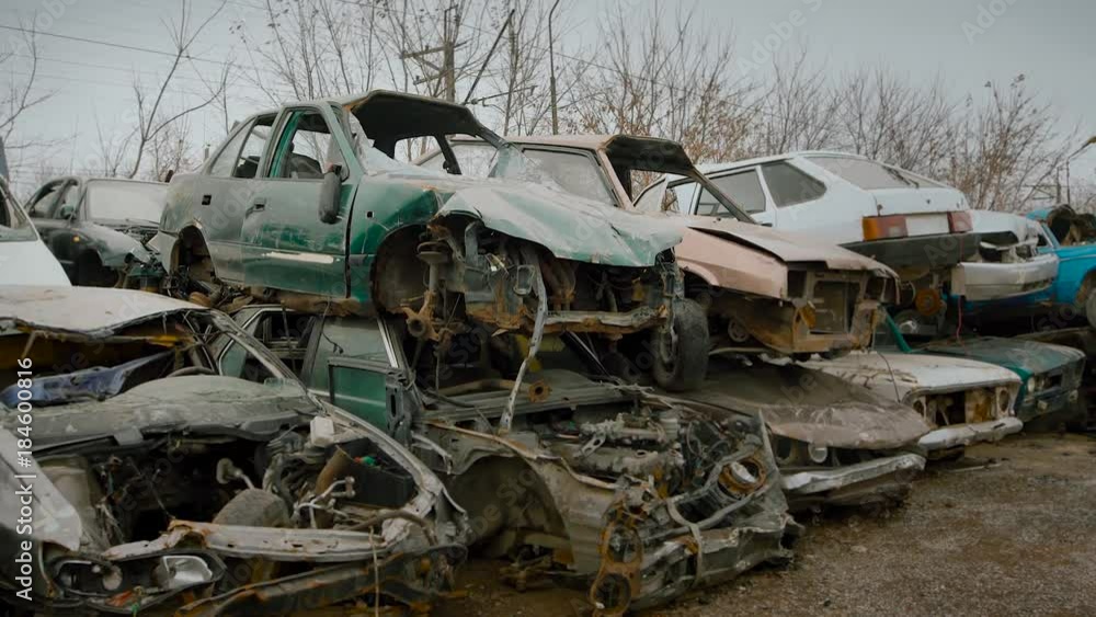 close up shot of the broken cars that are on the landfill of vehicles, rusted and broken cars are waiting for the recycling close up shot of the broken cars that are on the landfill of vehicles, rusted and broken cars are waiting for the recycling