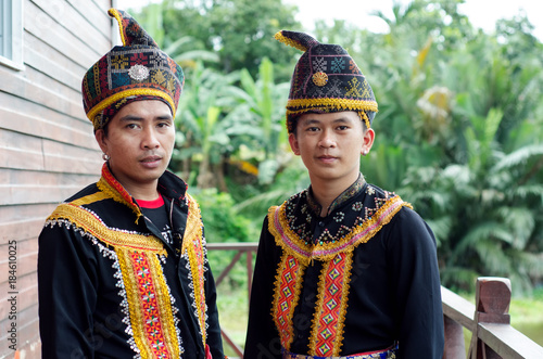 Young Men From Indigenous people of Sabah Borneo in East Malaysia in traditional attire during Musical and Dance Festival.