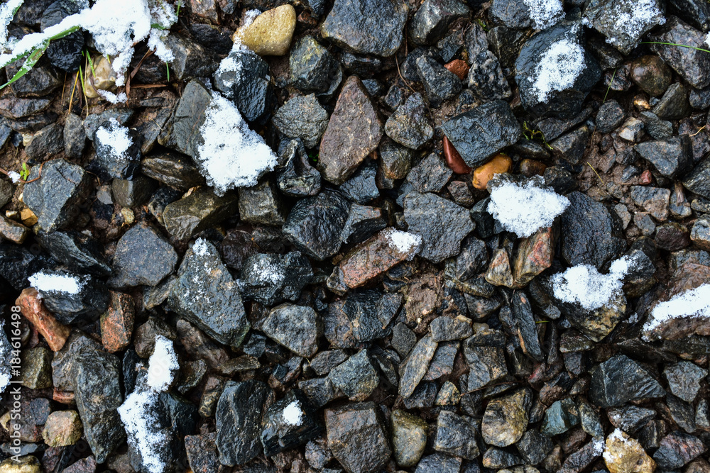 Stone beach in the snow, winter, frost, December Stone beach in the snow, winter, frost, December