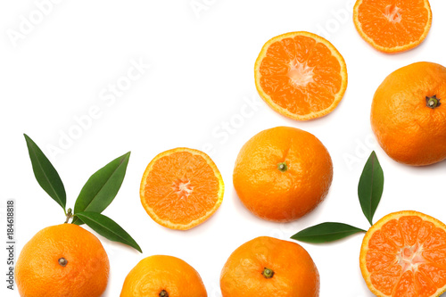 mandarin with slices and green leaf isolated on white background top view