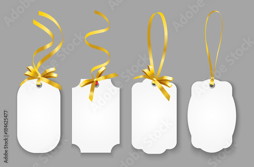 Vector realistic set of blank paper name tags or coupons with gold ribbons isolated on grey background